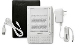 Kindle Electronic Reader. Book cover. Power adapter. USB 2.0 cable.
